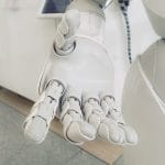 closeup photo of white robot arm